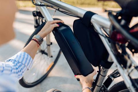 Female_Changing_her_Electric_Bike_Battery_480x480.jpg